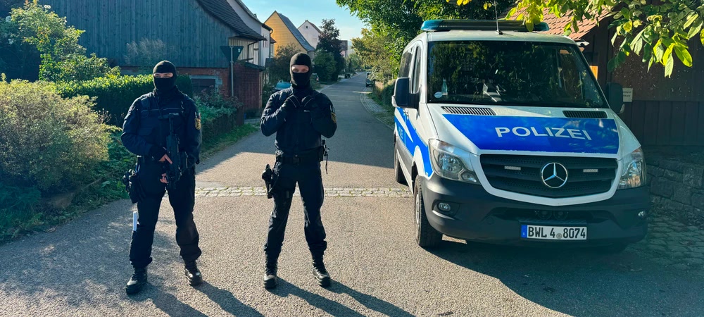 Police in Kupferzell, Baden-Wörttemberg, enforce the Artgemeinschaft ban, 2023