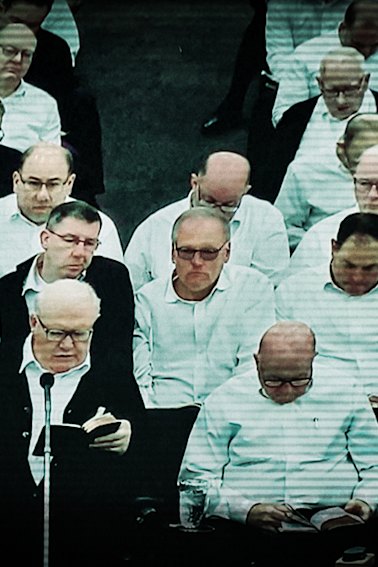 Bruce Hales (front left), global leader of the Plymouth Brethren Christian Church, preaching in the US